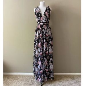 Absolutely a must have maxi criss cross back dress